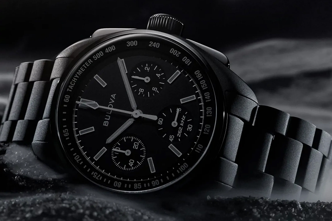 Bulova Lunar Pilot Black Hole on wrist — 41mm black PVD case with matching bracelet and limited-edition box set
