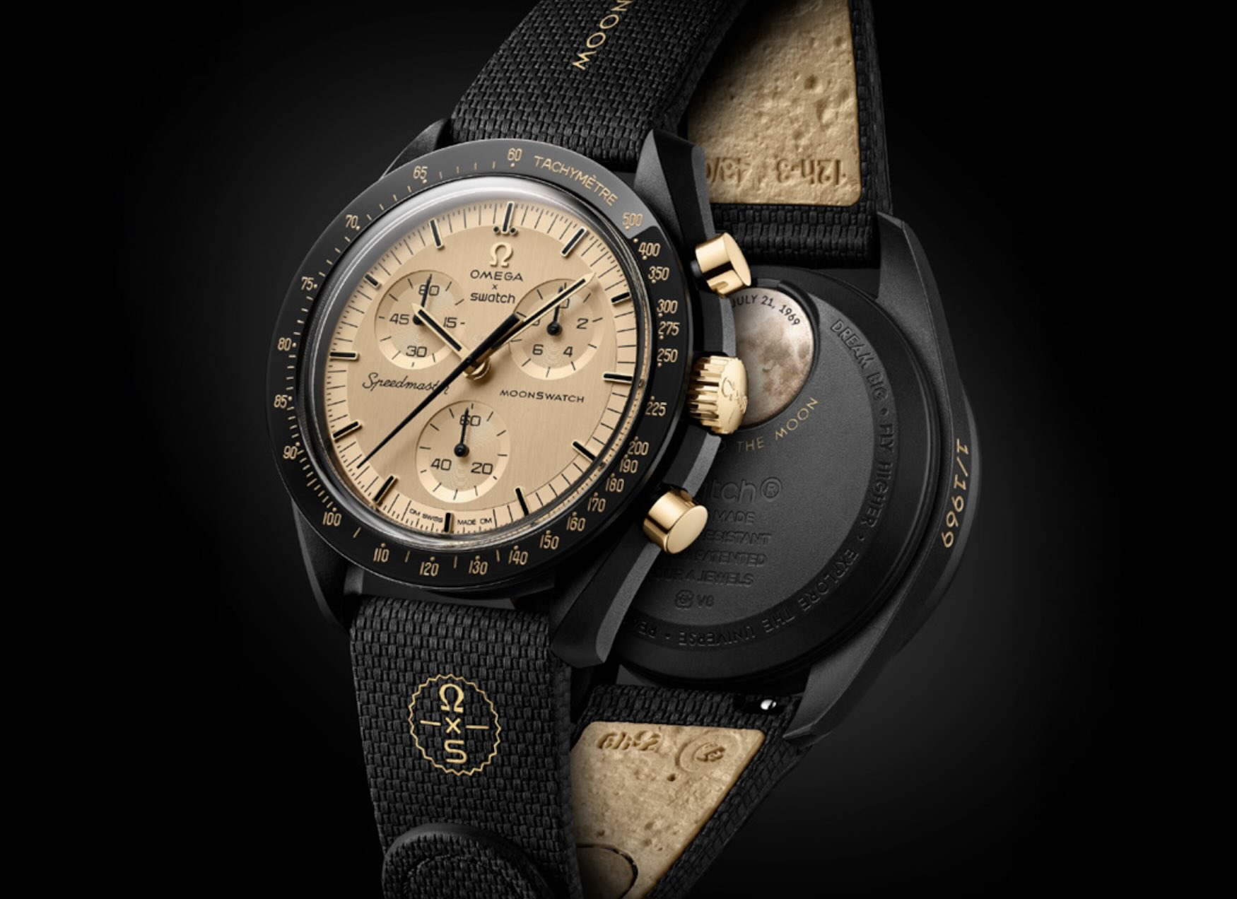 MoonSwatch Mission to the Moon 1969 — 42mm black Bioceramic watch with 18k Omega MoonShine Gold dial, hands and crown displayed against dark background