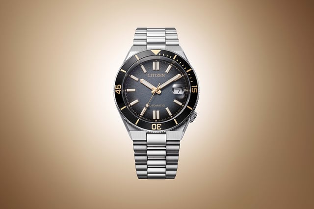 Citizen Tsuyosa Shore Limited Edition NJ0238-57E — black textured gradient dial with gold bezel scale, rotating bezel, integrated three-link bracelet
