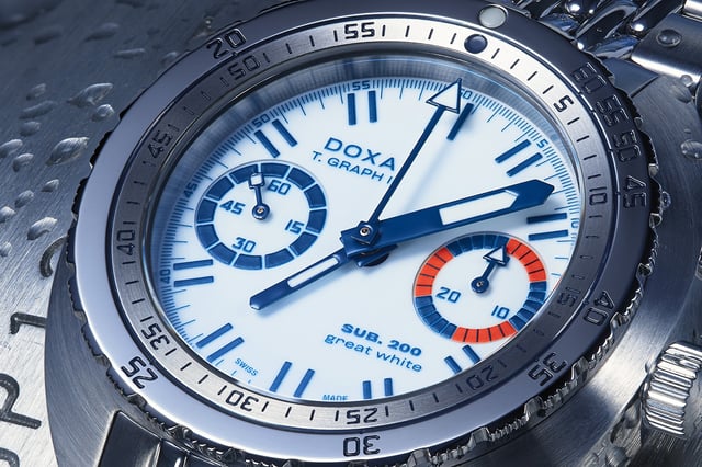 Doxa SUB T.Graph II Great White Topper Edition — fully luminous white dial with blue lacquer sub-dials, navy bezel scale, bi-compax chronograph layout
