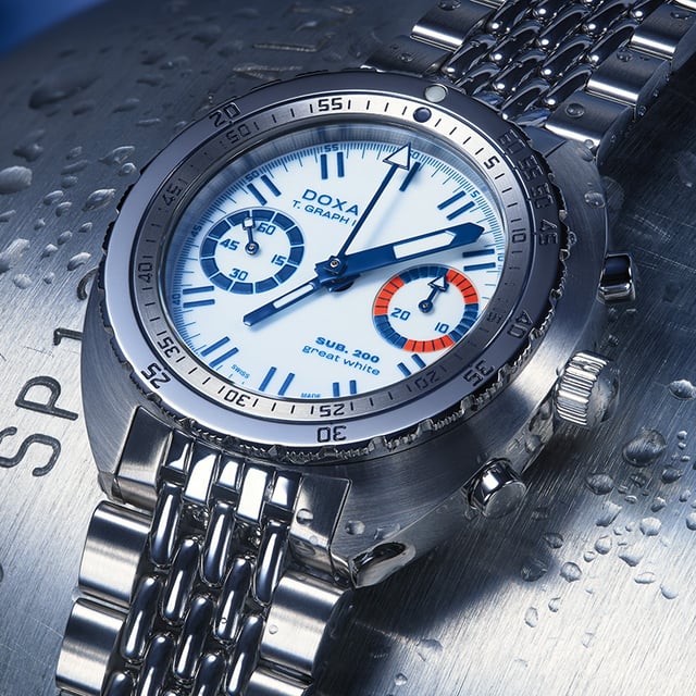 Doxa SUB T.Graph II Great White Topper Edition dial close-up — bi-compax layout with running seconds at 9 and 30-minute counter at 3, all Super-LumiNova BGW9