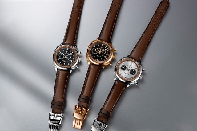 Breitling Top Time Aston Martin DB5 all three editions — steel, steel with platinum bezel, and red gold with onyx dial together