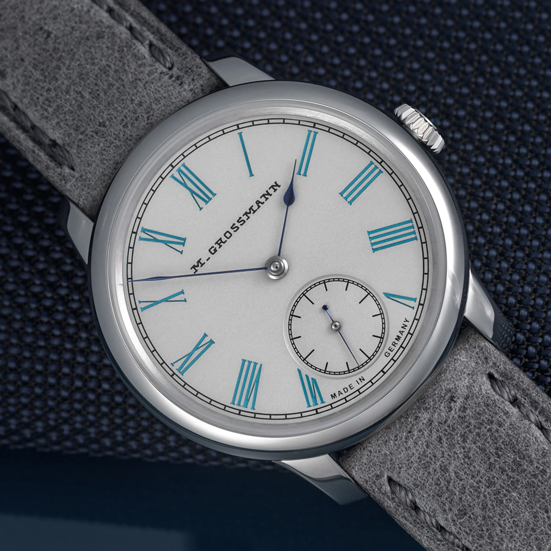 Moritz Grossmann Tefnut 36 caseback — Calibre 102.1 showing German silver 3/5 plate with Glashütte ribbing, hand-engraved balance cock with 1826 inscription