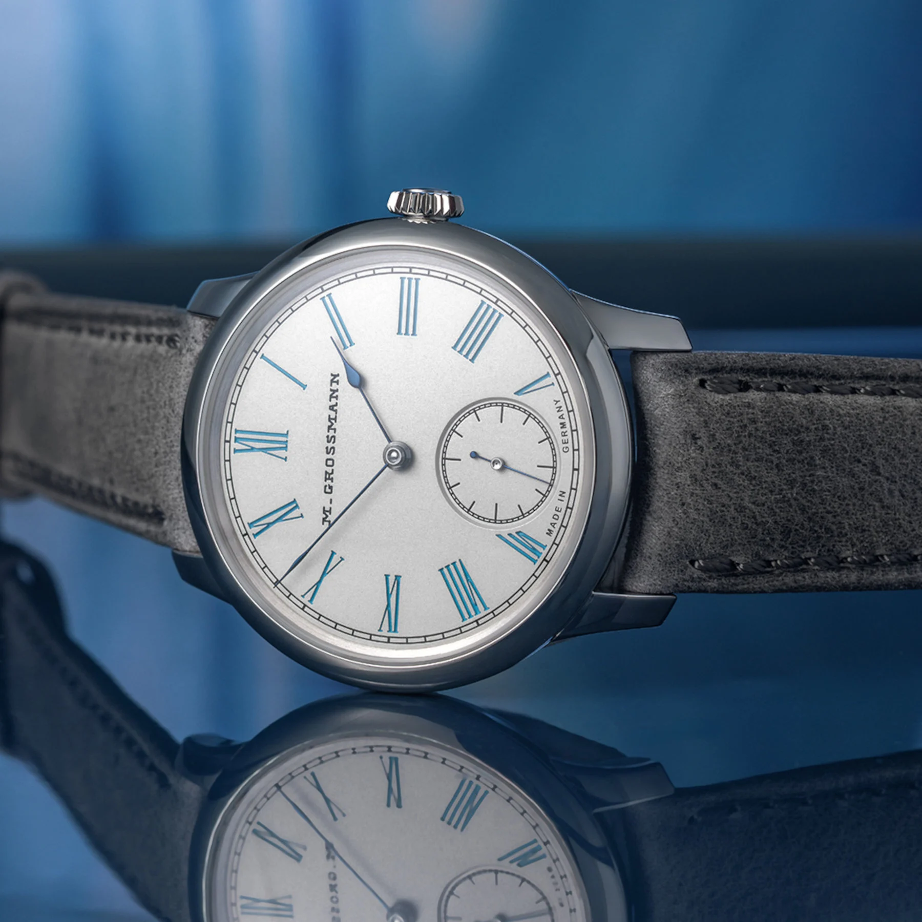 Moritz Grossmann Tefnut 36 Silver-Plated by Friction Turquoise Blue — fully polished 36mm steel case profile showing slim 8.5mm height
