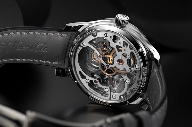 H. Moser Endeavour Cosmic Rain Calibre HMC 909 caseback — skeletonised movement visible through sapphire crystal with 415 components on display